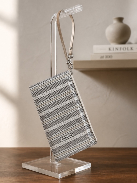 Coach Handbags - COACH Striped Wristlet in Cream and Black